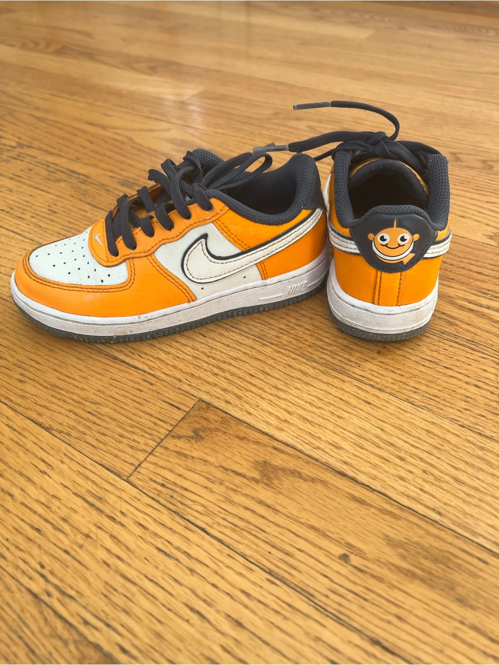 Nike Orange, White & Black Low-Top Sneakers with Nemo on Heel